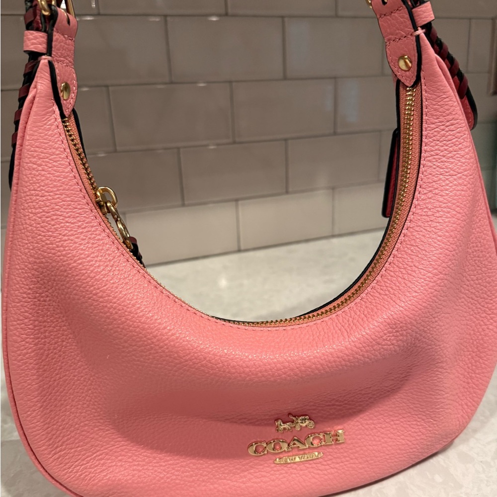 Coach Coral Leather Handbag with Gold Accents